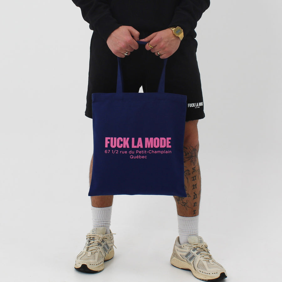 Navy Address tote bag with the “fuck la mode” logo and address in pink — streetwear clothing from Québec City.