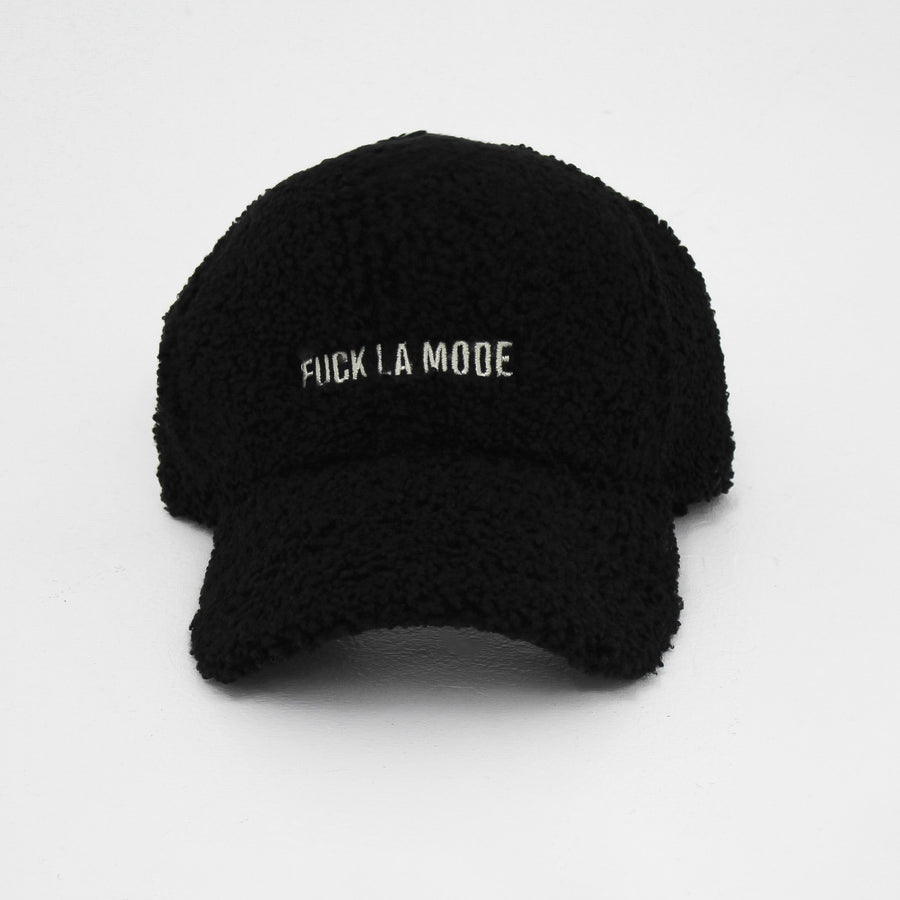 Black Sherpa “fuck la mode” cap with the “fuck la mode” logo in white— streetwear clothing from Québec City.