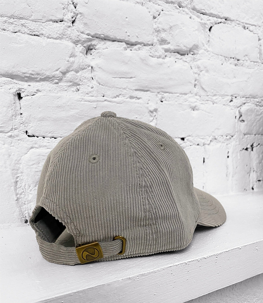 Corduroy cap with the “fuck la mode” script logo — streetwear clothing from Québec City.