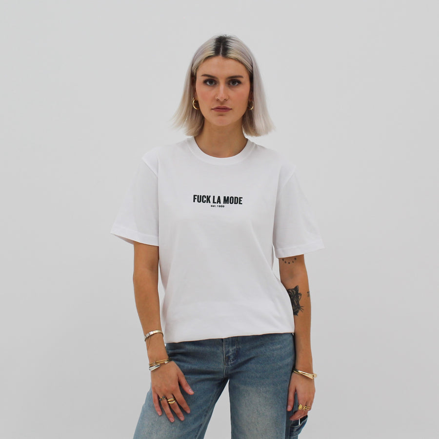 Unisex white classic tee with the “fuck la mode” logo in white — streetwear clothing from Québec City.