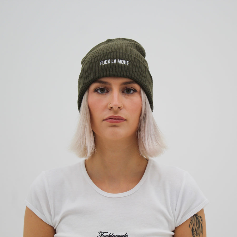 kaki cotton beanie with the embroidered “fuck la mode” logo in white — streetwear clothing from Québec City.