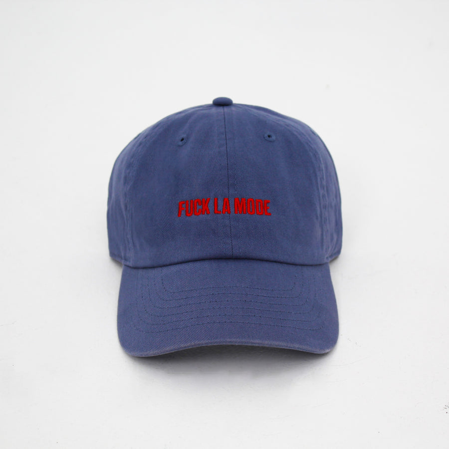 Navy cotton stone-washed cap with the “fuck la mode” logo in red — streetwear clothing from Québec City.