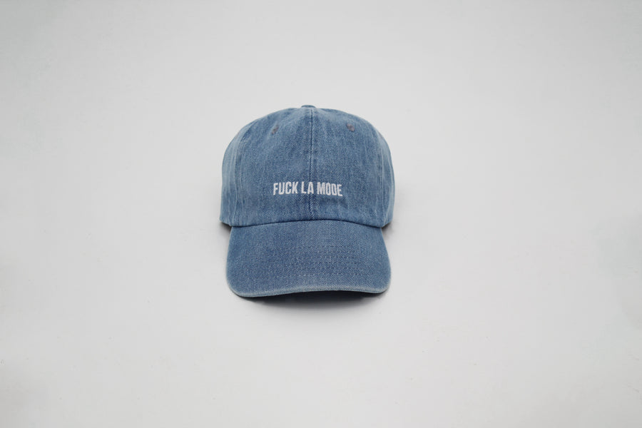 ChatGPT a dit :

Light blue denim cap with the embroidered “fuck la mode” logo in white — streetwear clothing from Québec City.