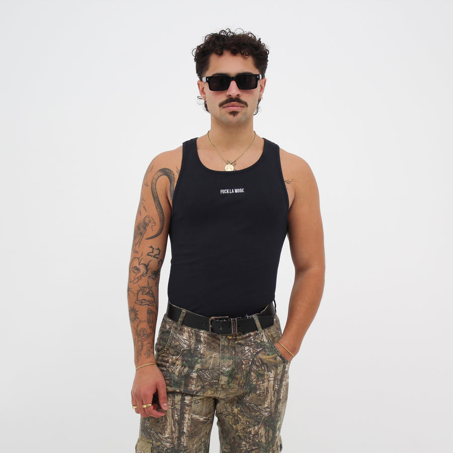 Black Wife Beater with the “fuck la mode” logo at the center of the chest — streetwear clothing from Québec City.