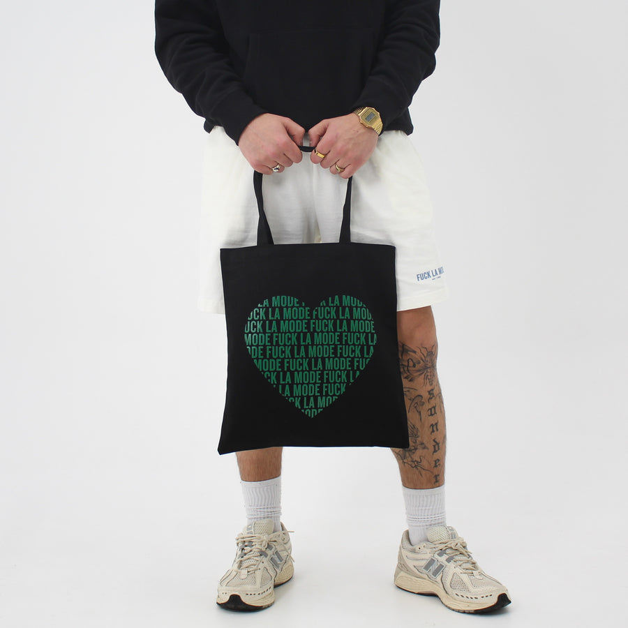 Black FLM tote bag with an “fuck la mode” heart — streetwear clothing from Québec City.