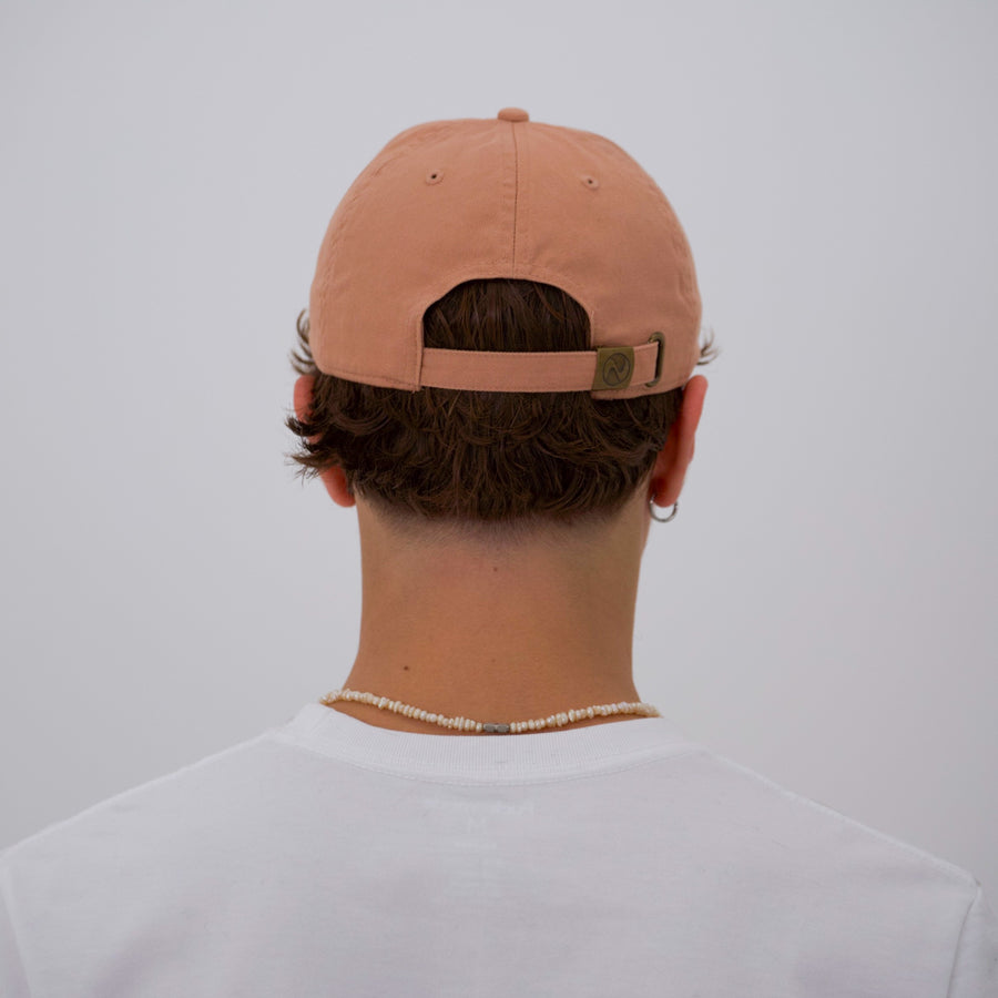 Orange cotton stone-washed cap with the “fuck la mode” logo in navy— streetwear clothing from Québec City.