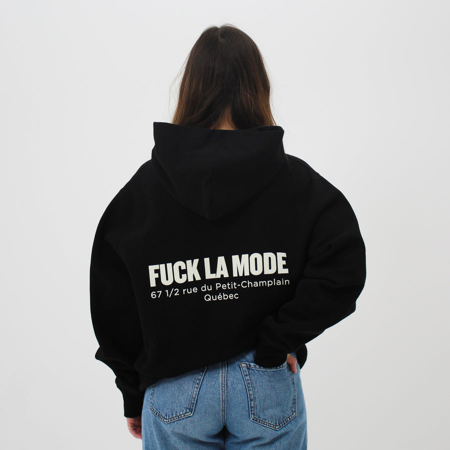 Oversized black address hoodie with creme lettering — streetwear clothing from Québec City.
