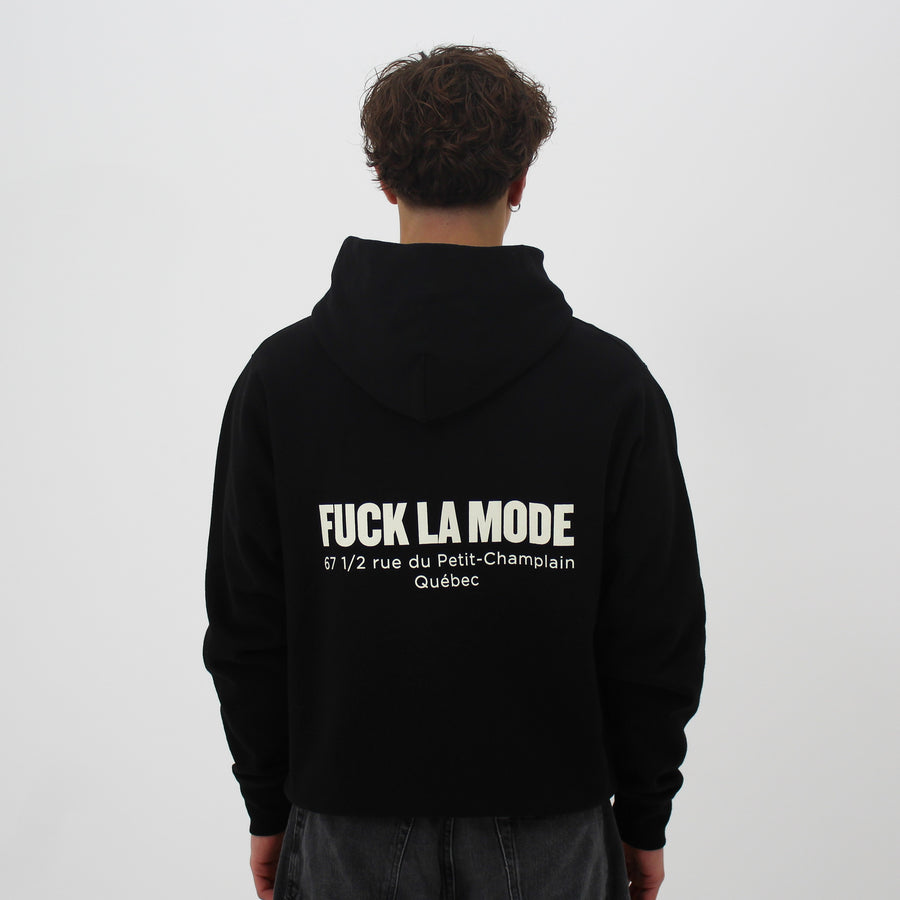 Oversized black address hoodie with creme lettering — streetwear clothing from Québec City.