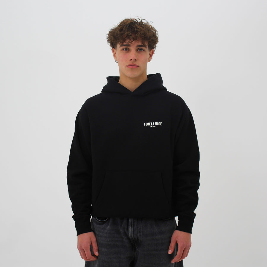 Oversized black address hoodie with creme lettering — streetwear clothing from Québec City.