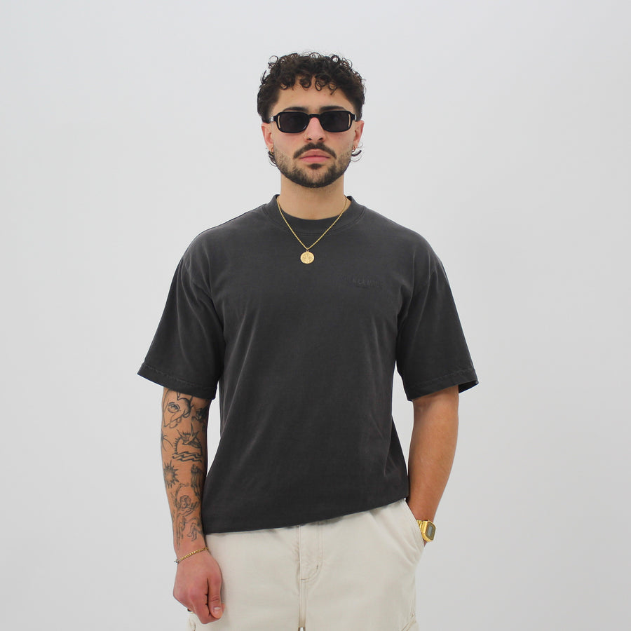 Oversized black address t-shirt — streetwear clothing from Québec City.