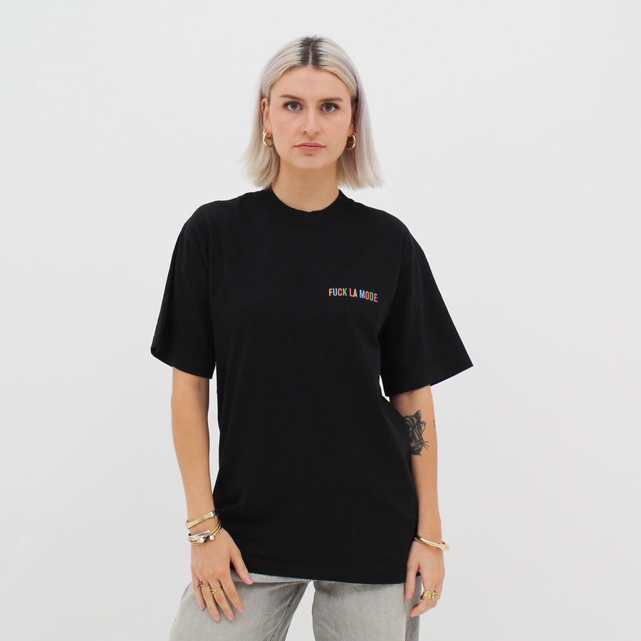 Black oversized t-shirt with the “fuck la mode” logo in rainbow — streetwear clothing from Québec City.
