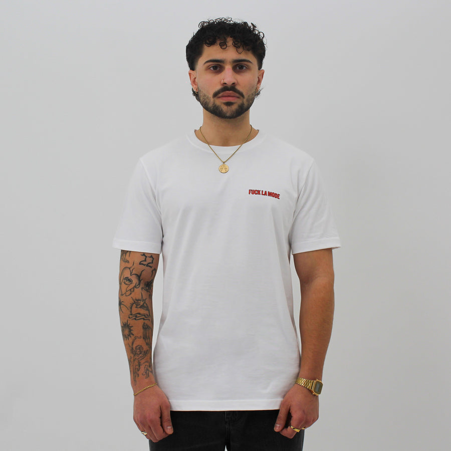 White t-shirt with black front store illustration and red “fuck la mode” logo — streetwear clothing from Québec City.