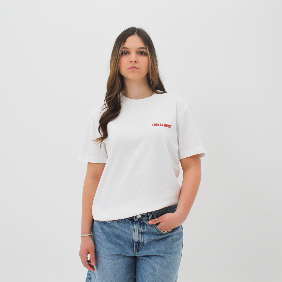 White t-shirt with black front store illustration and red “fuck la mode” logo — streetwear clothing from Québec City.