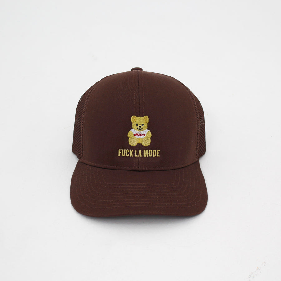 Brown teddy bear style trucker cap with the “fuck la mode” logo in cream — streetwear clothing from Québec City.