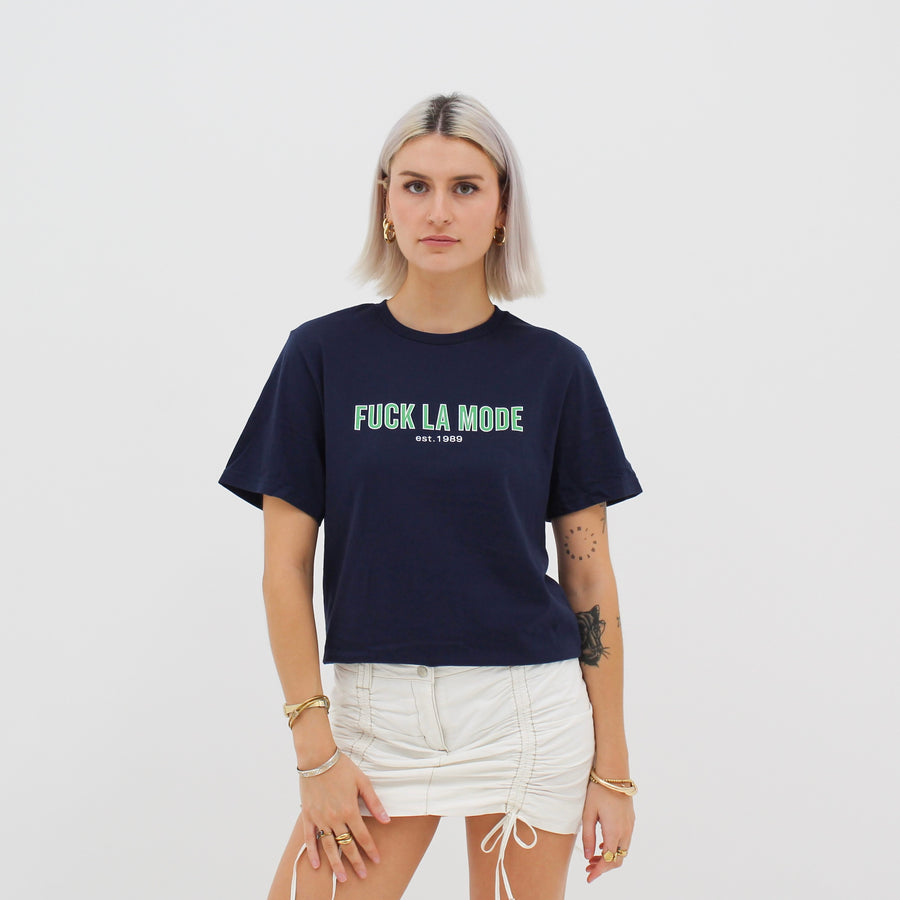 Unisex navy retro athletic t-shirt with the retro green “fuck la mode” logo — streetwear clothing from Québec City.