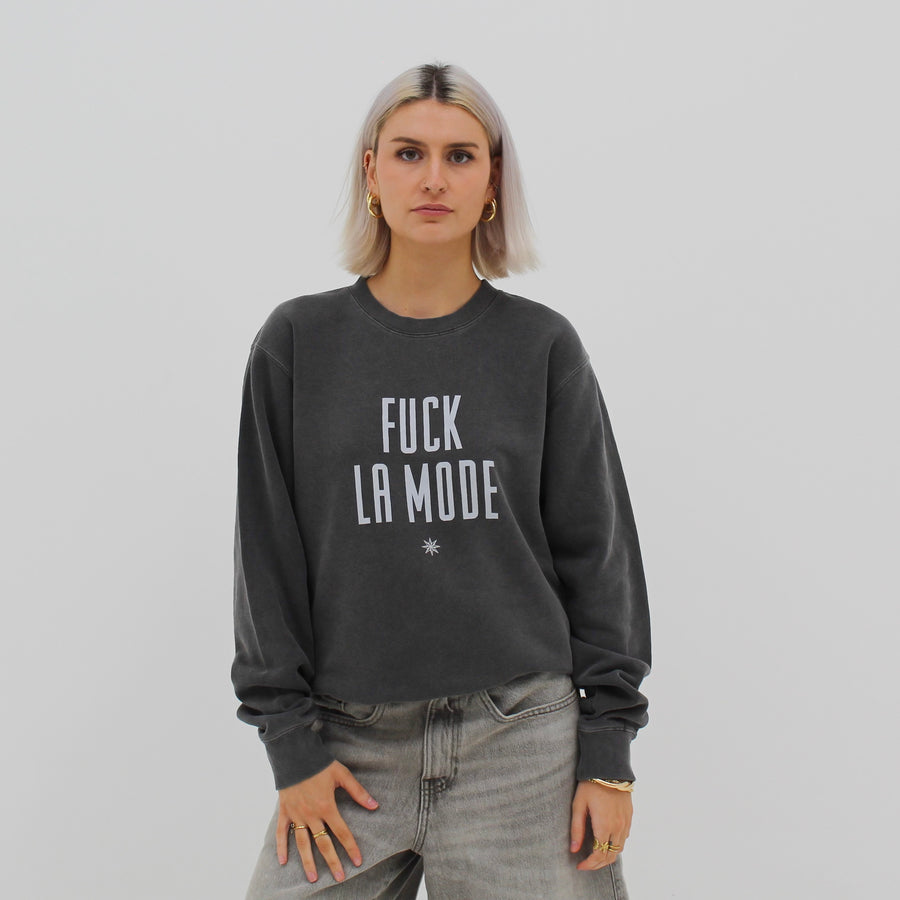 Vintage black “fuck la mode” sweater with vintage “fuck la mode” logo in white — streetwear clothing from Québec City.