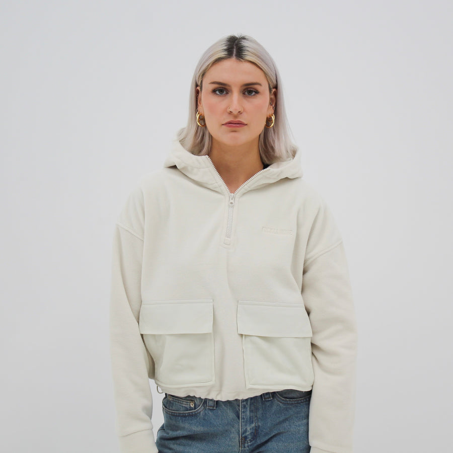 Women’s sherpa quarter-zip hoodie with a tone-on-tone “fuck la mode” logo — streetwear clothing from Québec City.