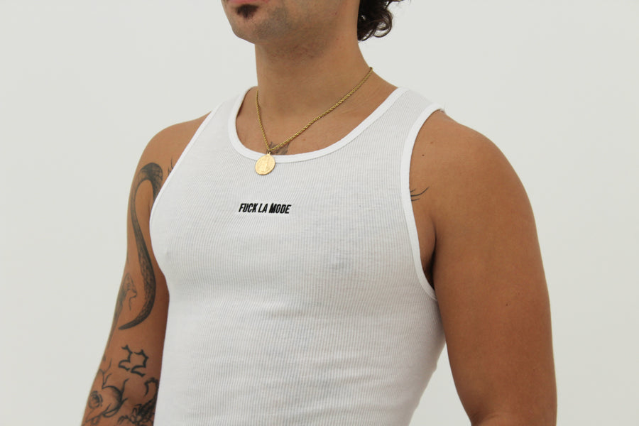 White Wife Beater with the “fuck la mode” logo at the center of the chest — streetwear clothing from Québec City.