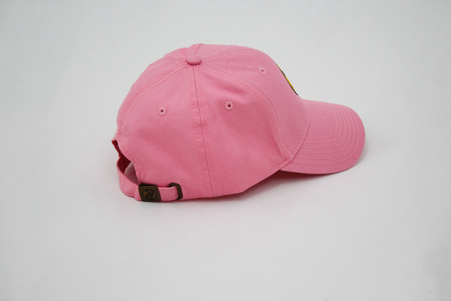 Pink trucker hat with a yellow smiley face “fuck la mode” — streetwear clothing from Québec City.